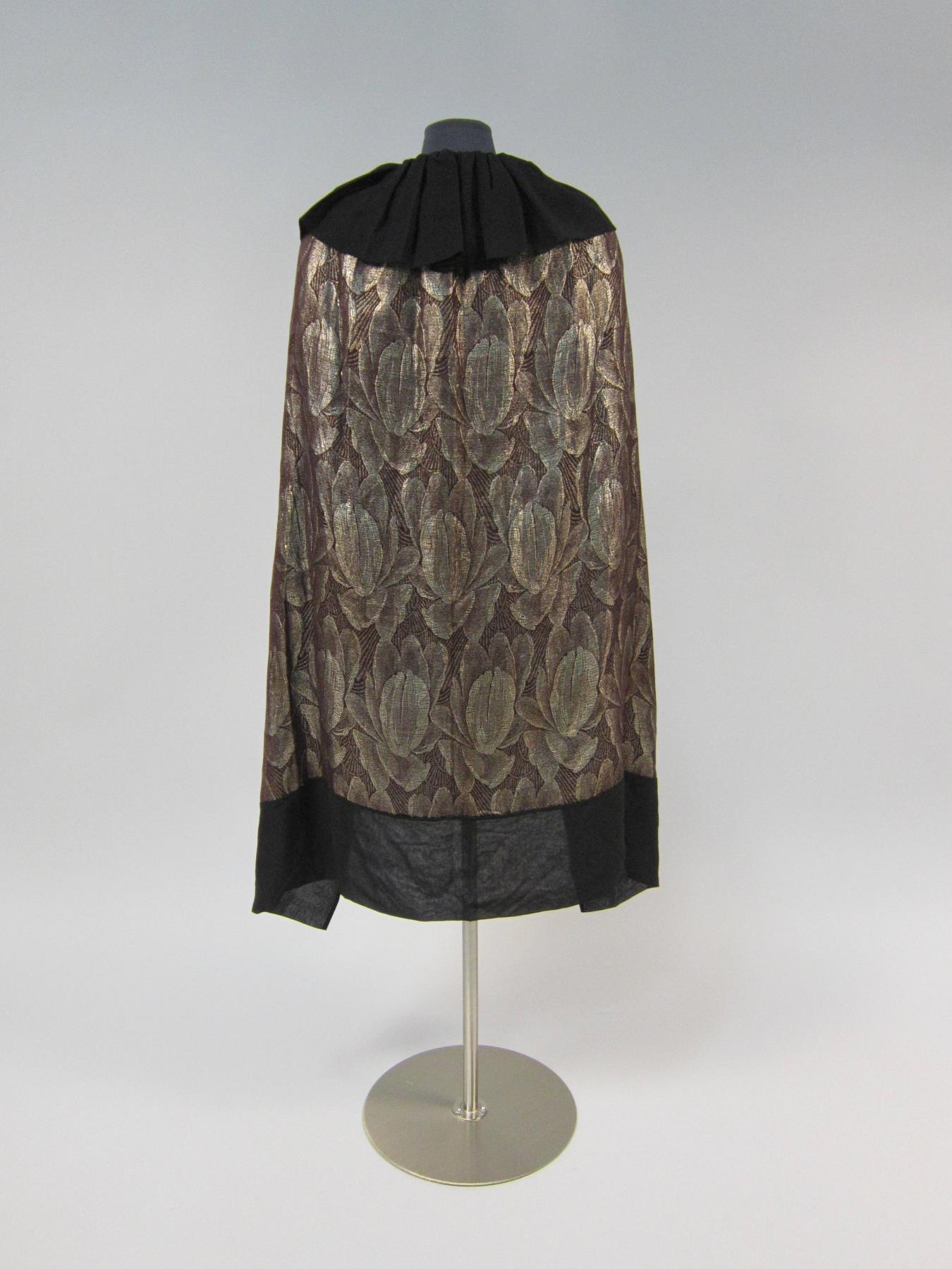 Image of Silver lamé and black chiffon cape, 1926